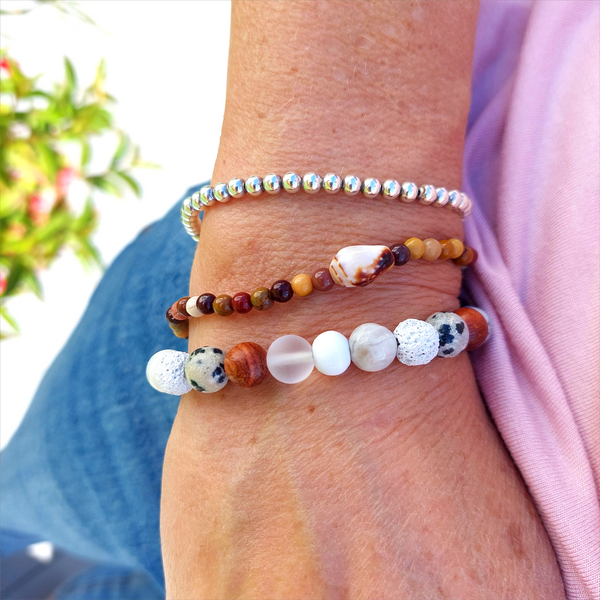 Lovely Handmade 8mm stone, lava, waxed wood &amp; dalmatian jasper bead bracelet in natural white tones, each bead is different!  Elasticated, so will fit most adult wrists (measuring 7.5in/19cm)  Perfect accessory for your Summer outfits!  Presented in lovely Kraft paper gift box with reusable organza pouch