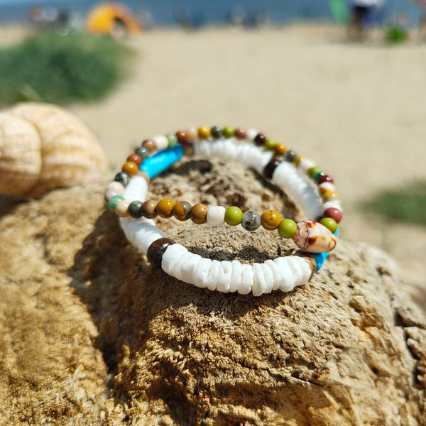 Super cool handcrafted collection of 2 Beaded Surf Bracelets  Each Bracelet is individually designed one with white puka shell bracelets with coconut discs, ceramic tubes &amp; wood beads. &amp; the second with 4mm multi brown natural stone quartz beads with cute little shell. A perfect Summer combination!  Choose from Blue or Yellow
