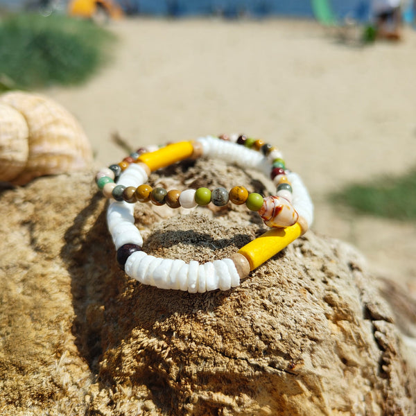 Super cool handcrafted collection of 2 Beaded Surf Bracelets  Each Bracelet is individually designed one with white puka shell bracelets with coconut discs, ceramic tubes &amp; wood beads. &amp; the second with 4mm multi brown natural stone quartz beads with cute little shell. A perfect Summer combination!  Choose from Blue or Yellow