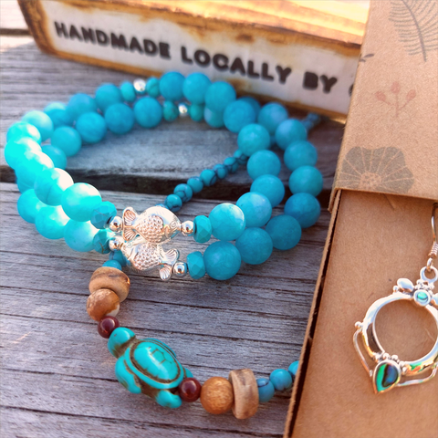 Gorgeous 8mm Sea Blue Matt Beads with Sterling Silver Beads &amp; Cute Fish Charm  Elasticated, so will fit most adult wrists (measuring 7.5 in/19cm)   Add a cool beach vibe look to your outfit&nbsp;  **Presented in lovely Kraft paper gift box with reusable organza pouch**