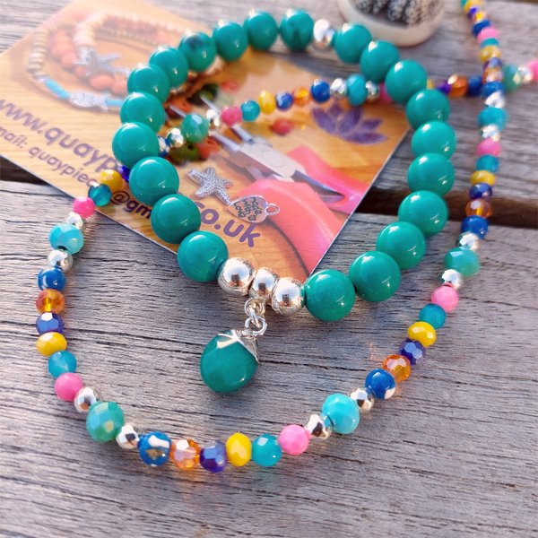 Lovely short necklace in blue &amp; multi coloured beads.
Handmade using 4mm agate, glass, natural stone &amp; silver plated hematite beads.

Silver plated fastenings &amp; lobster clasp with silver (nickel free) 'made with love' heart charm


Length - 40cm with extension chain to 43cm

Great little gift for a friend!